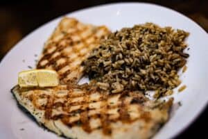 grilled rainbow trout with a side of wild rice blend