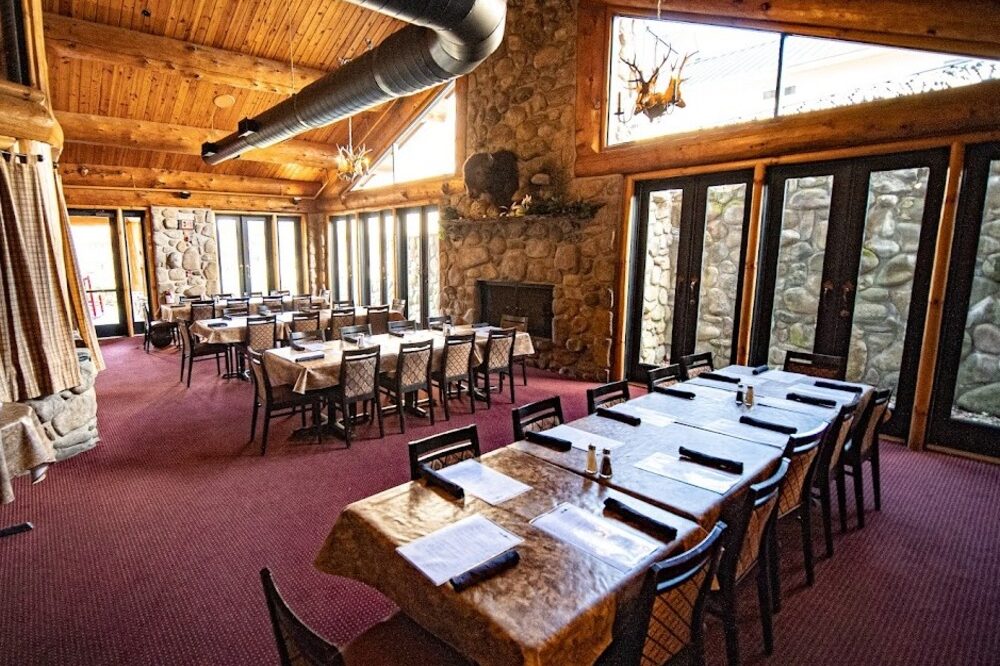 dining room at The Park Grill with large stone fireplace