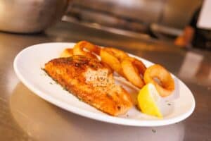 Grilled Atlantic Salmon and onion rings at The Park Grill